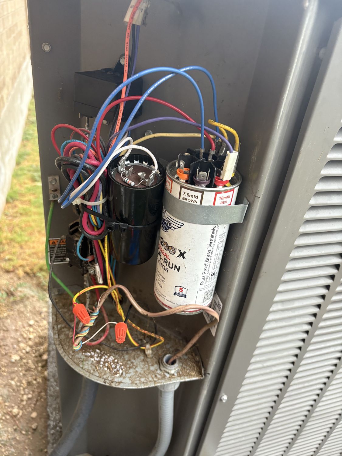 A capacitor and wiring repair on an HVAC system