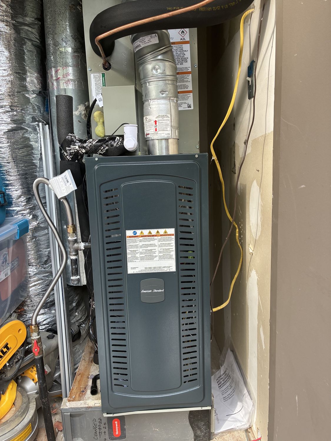 An air handler installed in an attic